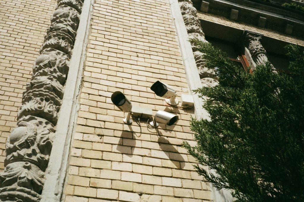 a couple of lights that are on the side of a building