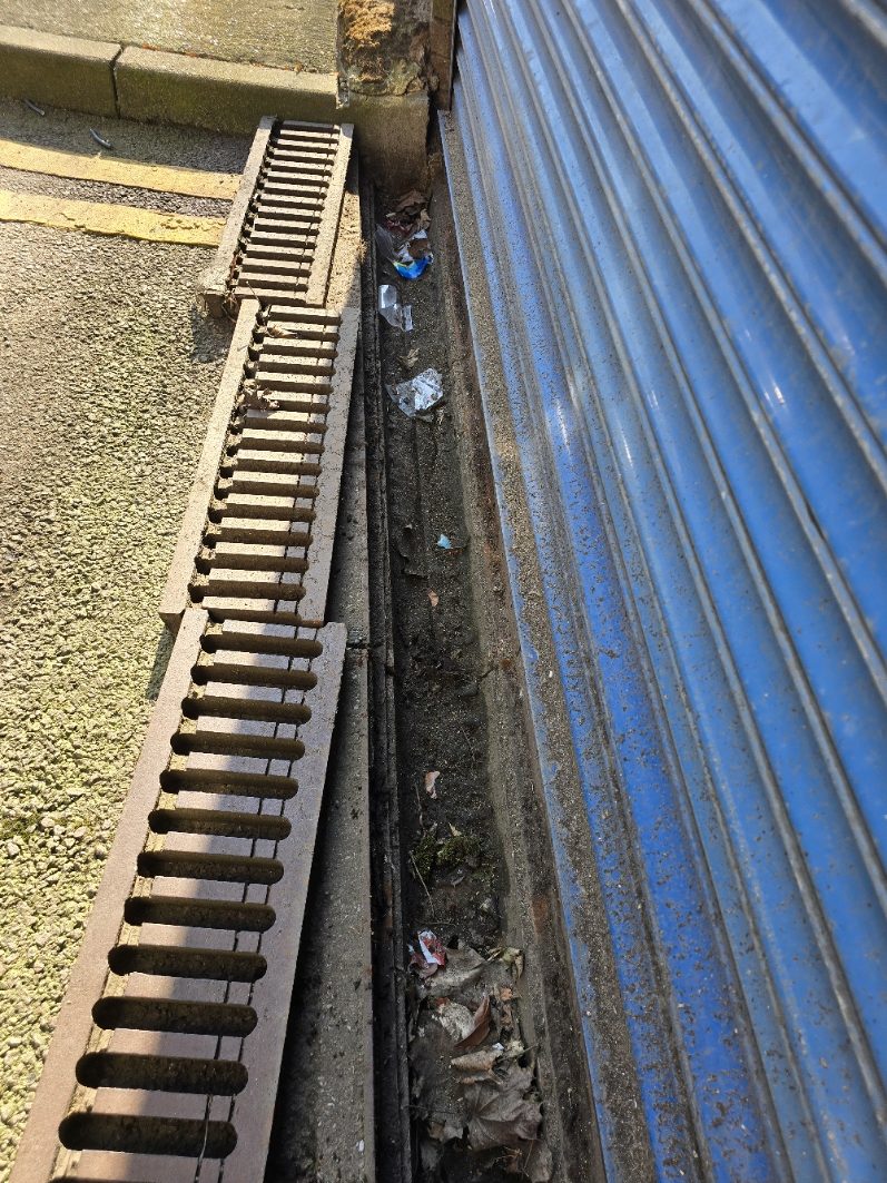 Metal strips with water reflections