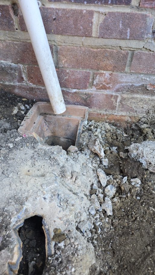 Ground with excavated area