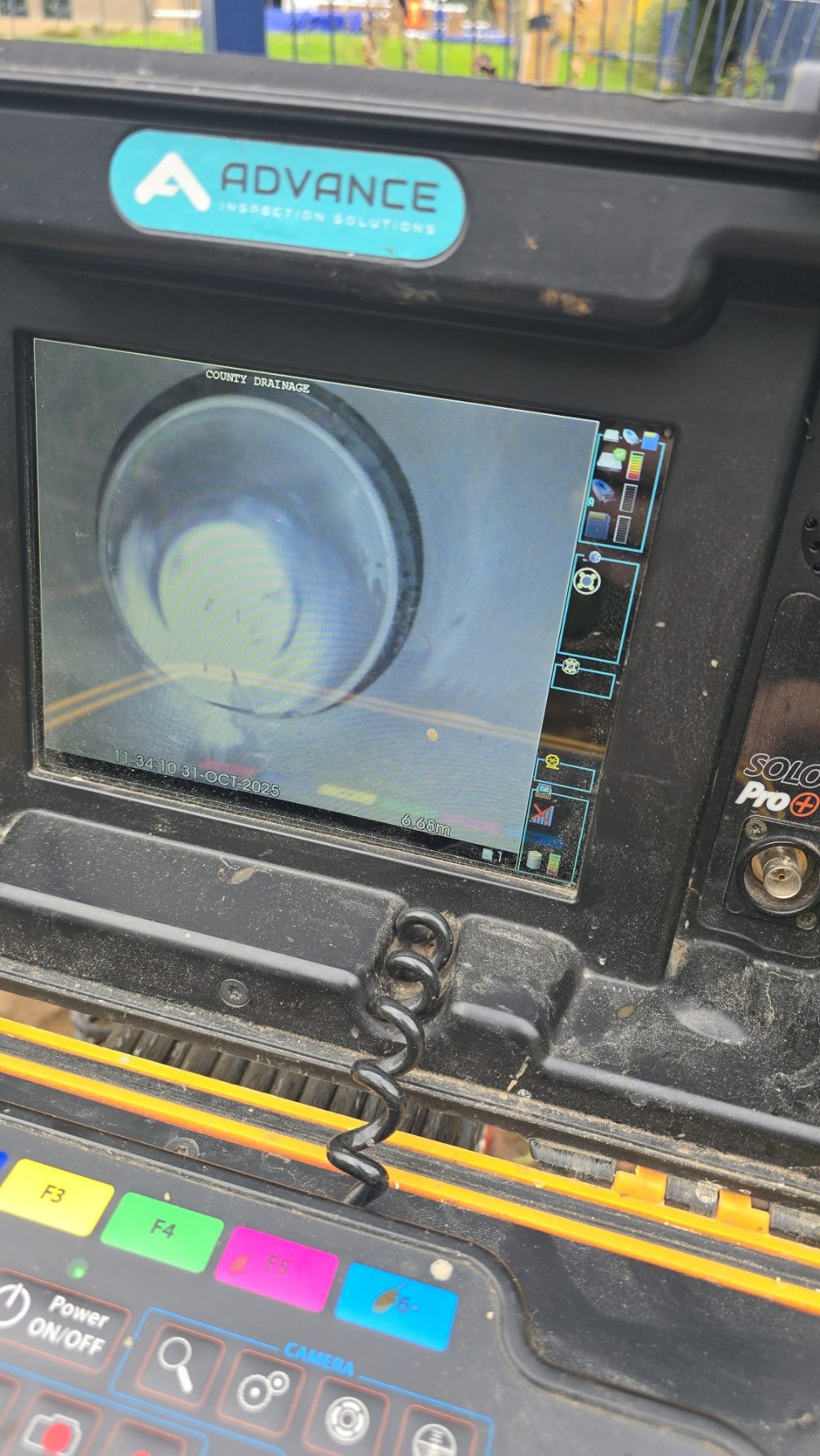 1. Close-up of a computer screen displaying various applications and icons on a desktop background.